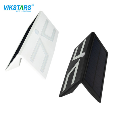 Luz accionada solar 4pcs RGB IP65 6000K de la pared de DC 3.2V LED del patio
